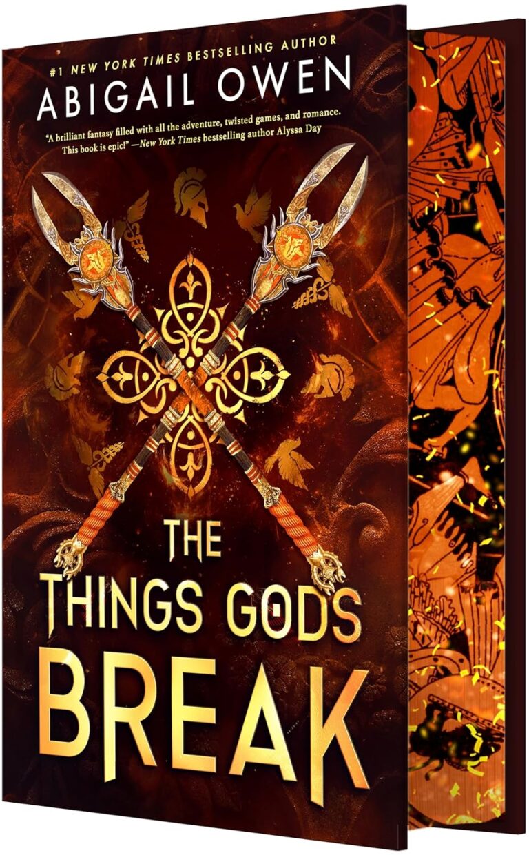 A book cover for The Things Gods Break by Abigail Owen, featuring two crossed golden spears with fiery designs on a dark, ornate background. The bold yellow title and intricate patterns hint at a culture shaped by legendary struggles.