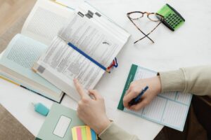 An author workspace with notes and a checklist, symbolizing thoughtful next steps.